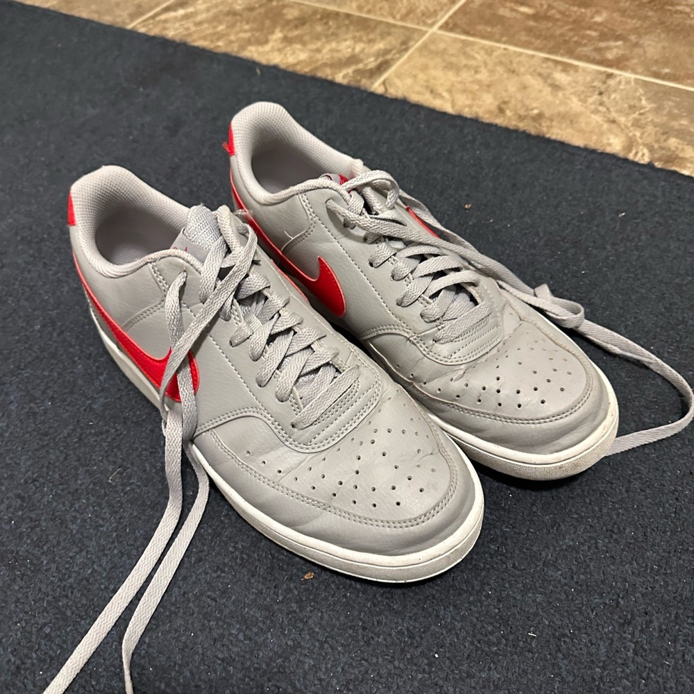 Nike gray and red shoes